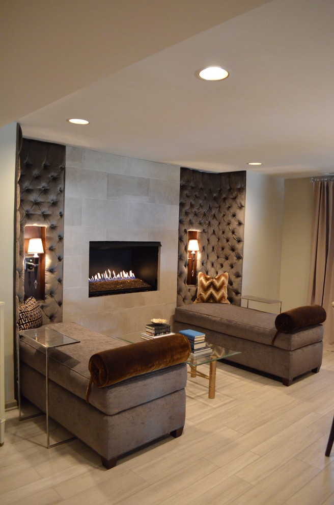 Photo of a contemporary living room in Indianapolis with beige walls, a ribbon fireplace, a tile fireplace surround, light hardwood floors and beige floor.