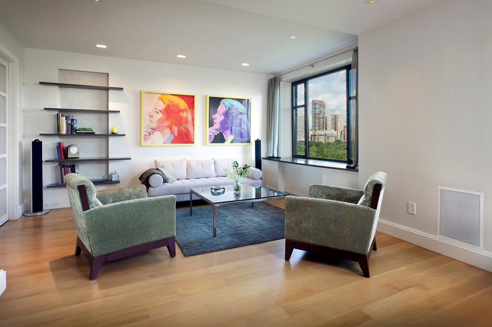 Contemporary family room in New York with white walls.