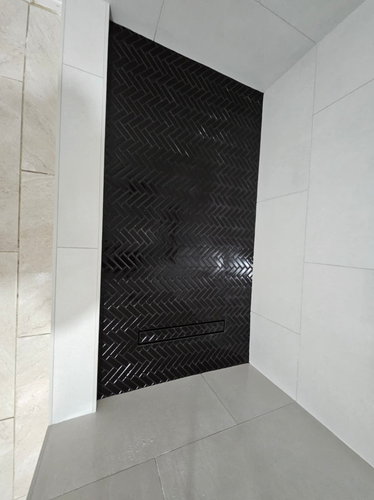 Shower remodel with black shower floor