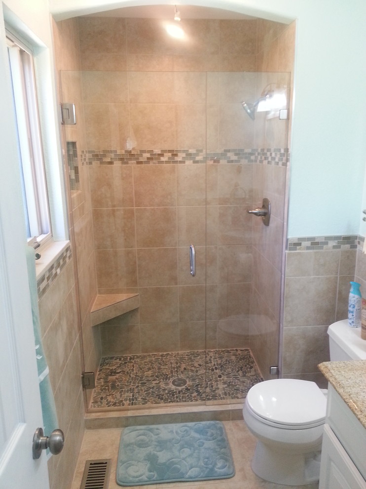 Inspiration for a mid-sized transitional 3/4 beige tile and porcelain tile porcelain tile and beige floor alcove shower remodel with raised-panel cabinets, white cabinets, a two-piece toilet, blue walls, an undermount sink, laminate countertops, a hinged shower door and multicolored countertops