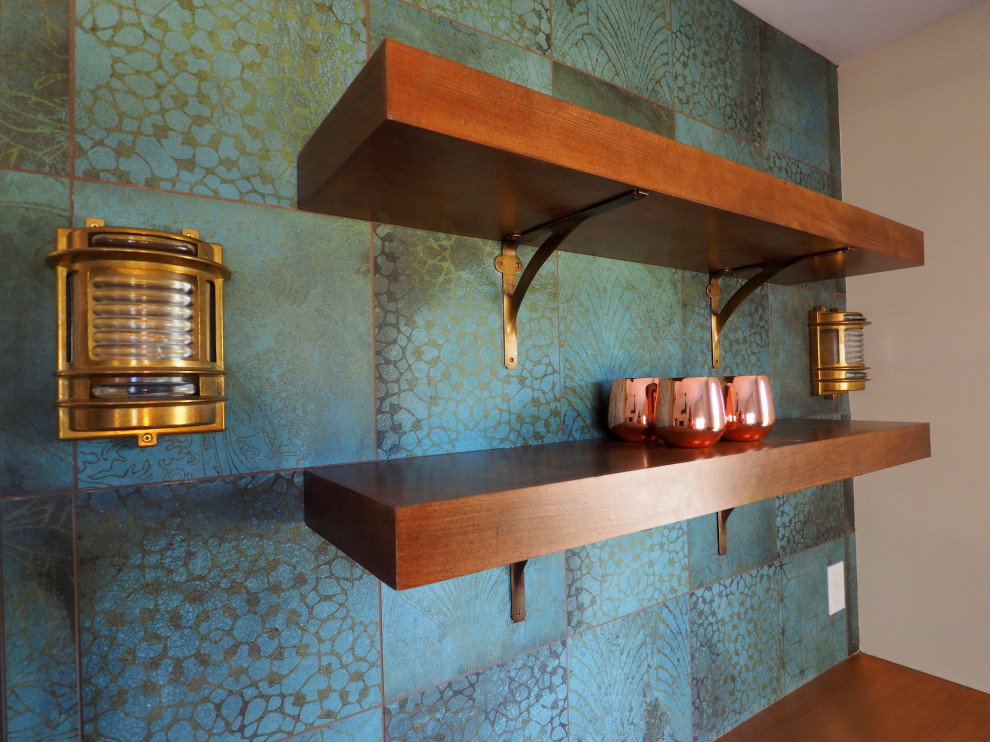Inspiration for a small beach style single-wall wet bar in Burlington with an integrated sink, shaker cabinets, copper benchtops, green splashback and porcelain splashback.