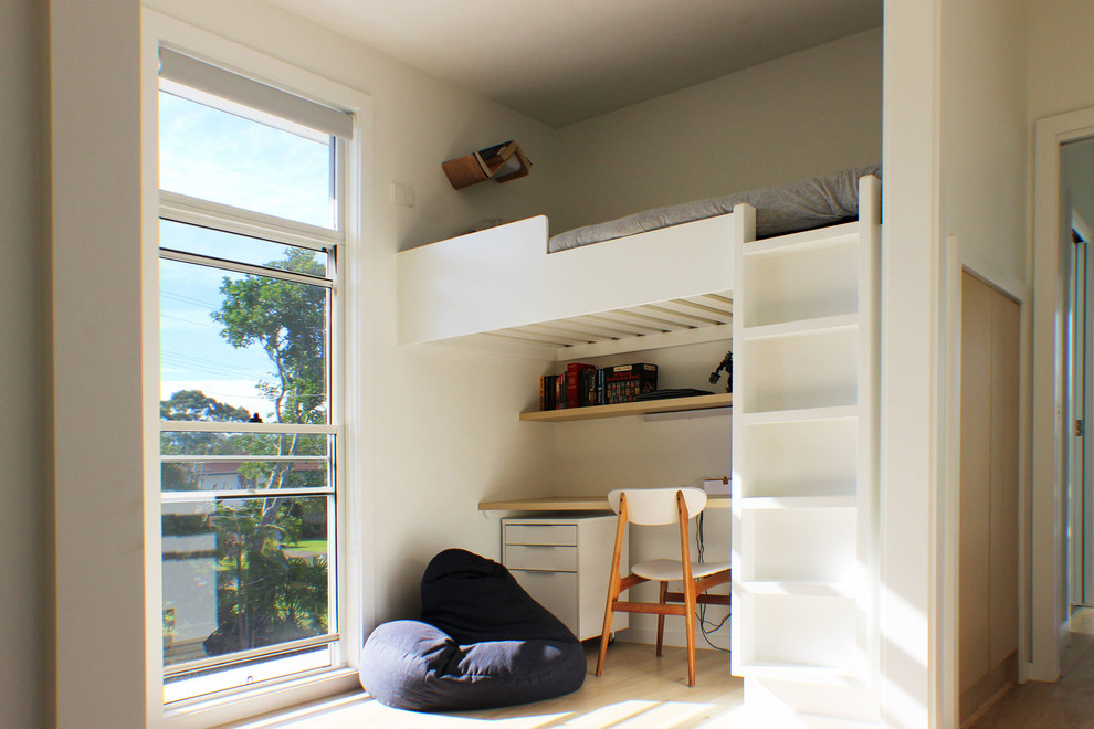 This is an example of a small contemporary kids' room in Central Coast with white walls and light hardwood floors.