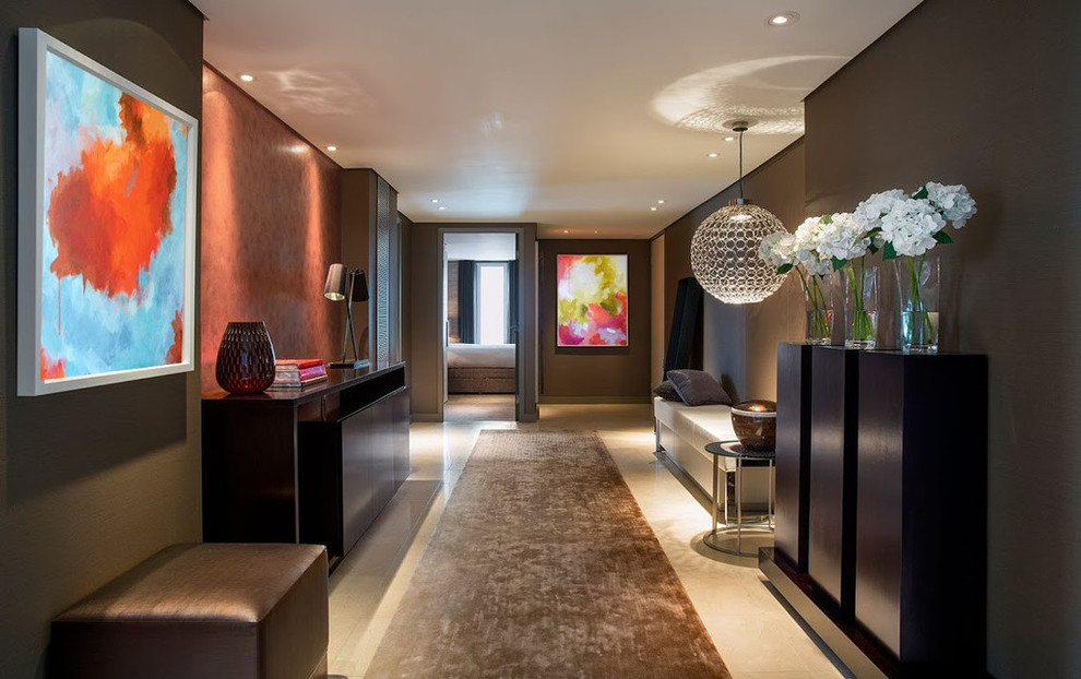 Photo of a contemporary hallway in London with brown walls.