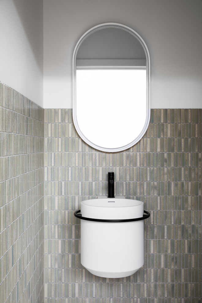 Design ideas for a contemporary cloakroom in Melbourne with green tiles.