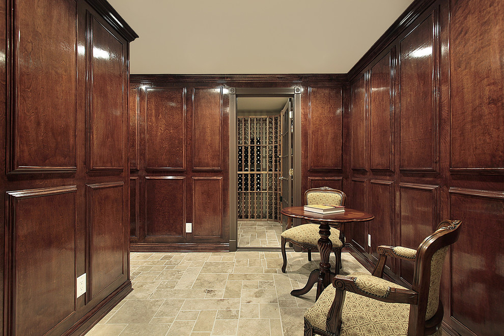 Mid-sized traditional wine cellar in New York with ceramic floors, storage racks and beige floor.