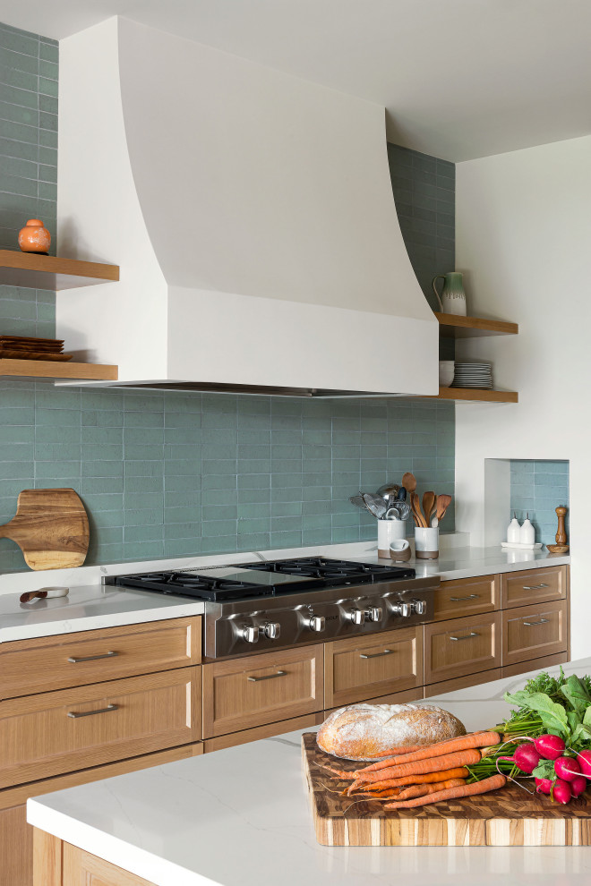 Example of a large transitional porcelain tile kitchen design