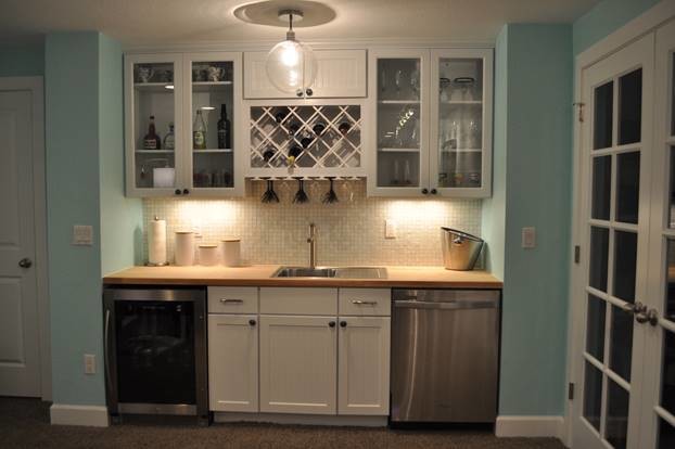 Basement - mid-sized transitional carpeted basement idea in Denver with blue walls