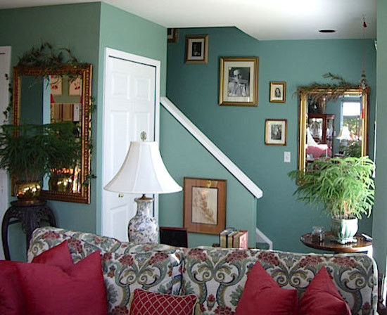 Mid-sized traditional living room in Denver with green walls and carpet.