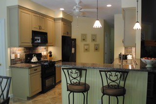 Kitchen Remodel with Maple Cabinets and Multicolored Slate Look Backsplash