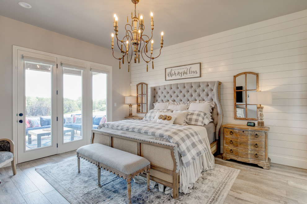 Design ideas for a mid-sized country master bedroom in Dallas with white walls, ceramic floors, no fireplace, grey floor and planked wall panelling.
