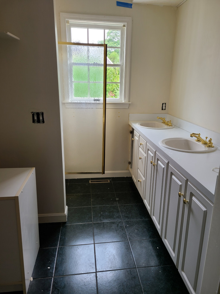 Master bath shower and vanity before.