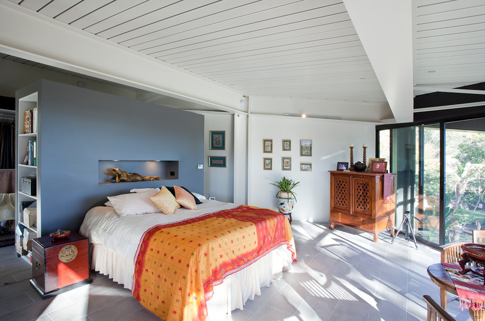 Contemporary master bedroom in San Francisco with blue walls.