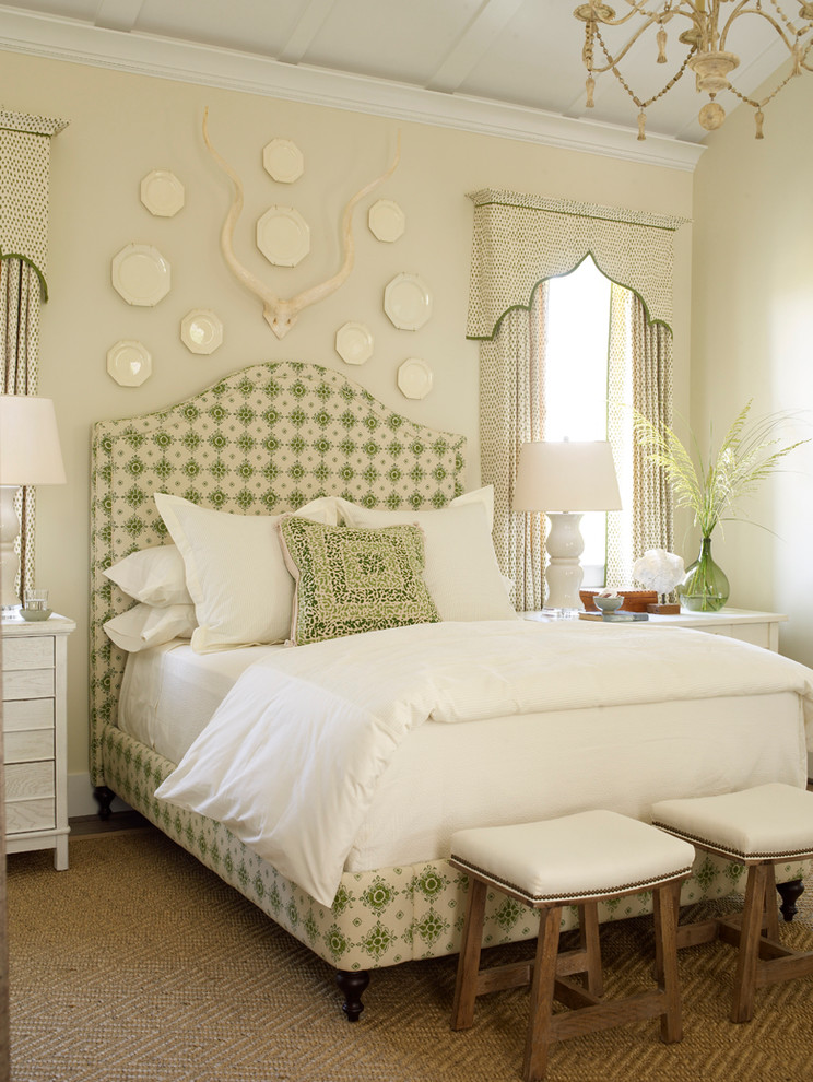 Photo of a traditional master bedroom in Jacksonville with beige walls.