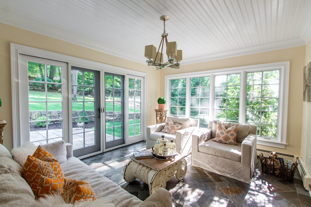 Inspiration for a mid-sized traditional sunroom in New York with slate floors and a standard ceiling.