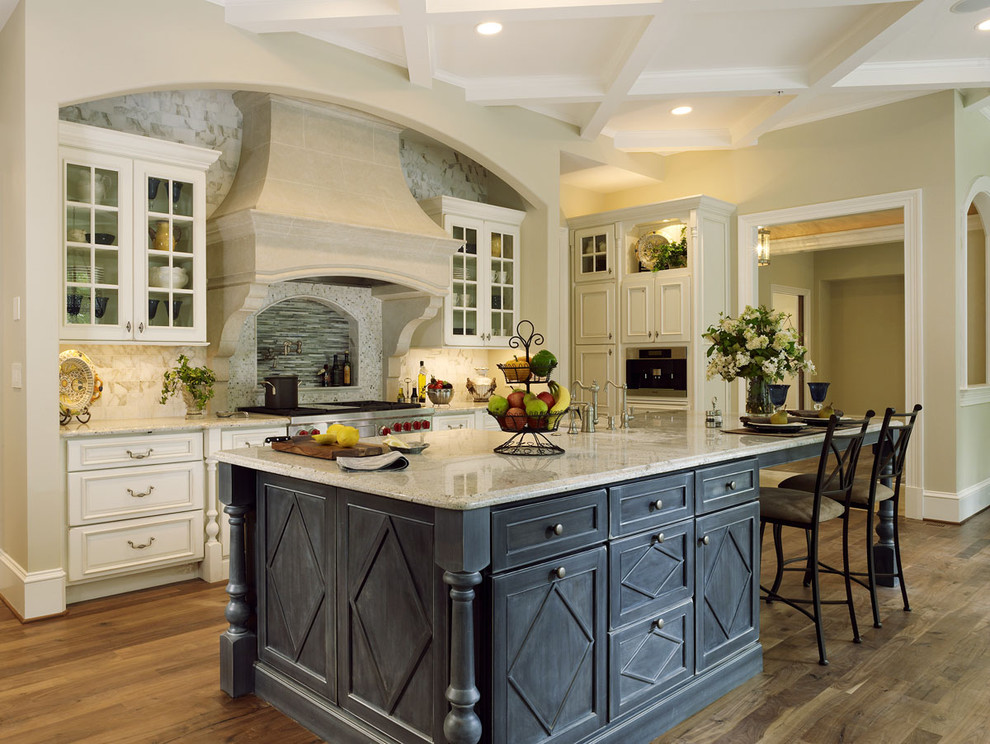 Design ideas for an expansive traditional l-shaped kitchen in Baltimore with beige splashback, stone slab splashback, stainless steel appliances, with island, a farmhouse sink, beaded inset cabinets, white cabinets, granite benchtops, dark hardwood floors and brown floor.