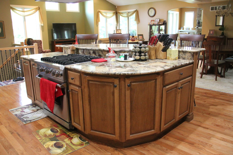 This is an example of a traditional kitchen in Chicago with a drop-in sink and ceramic floors.
