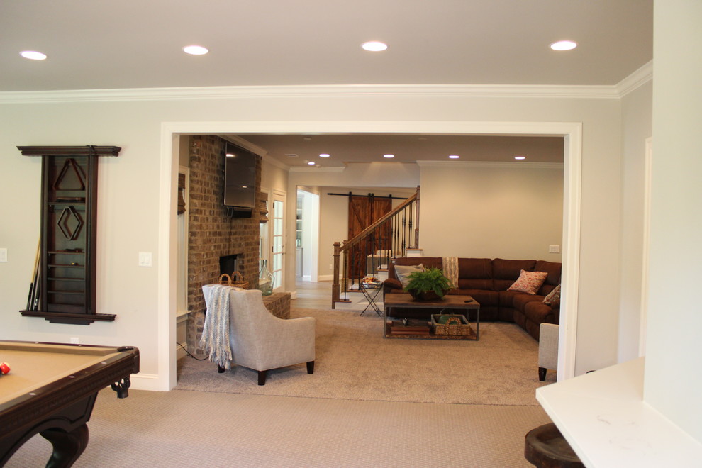 This is an example of a country basement in Atlanta with grey walls and ceramic floors.