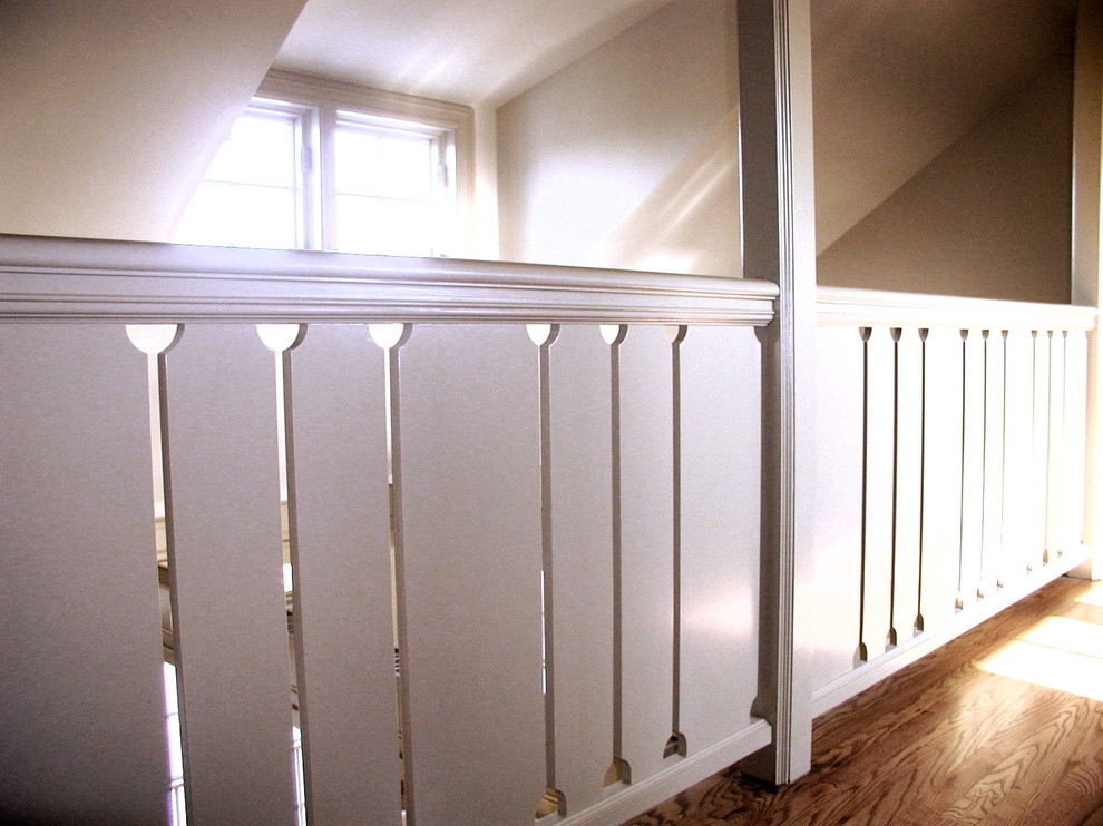 Example of a mid-sized transitional staircase design in Providence