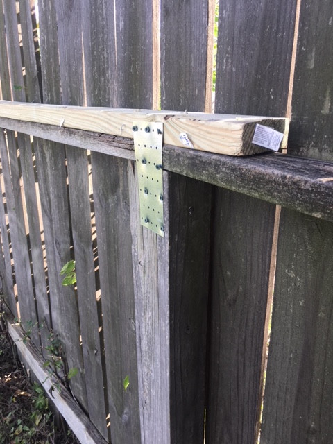 Reinforced Repaired Wood Fence