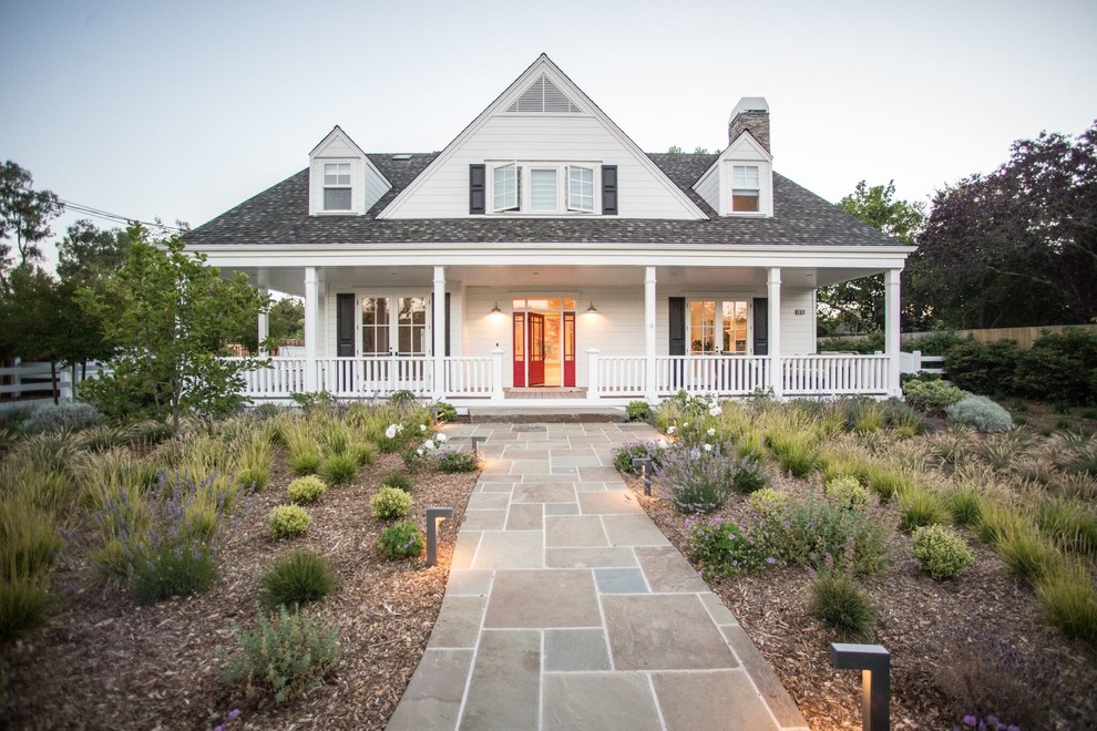 Inspiration for a country one-storey white house exterior in San Francisco with a hip roof and a shingle roof.