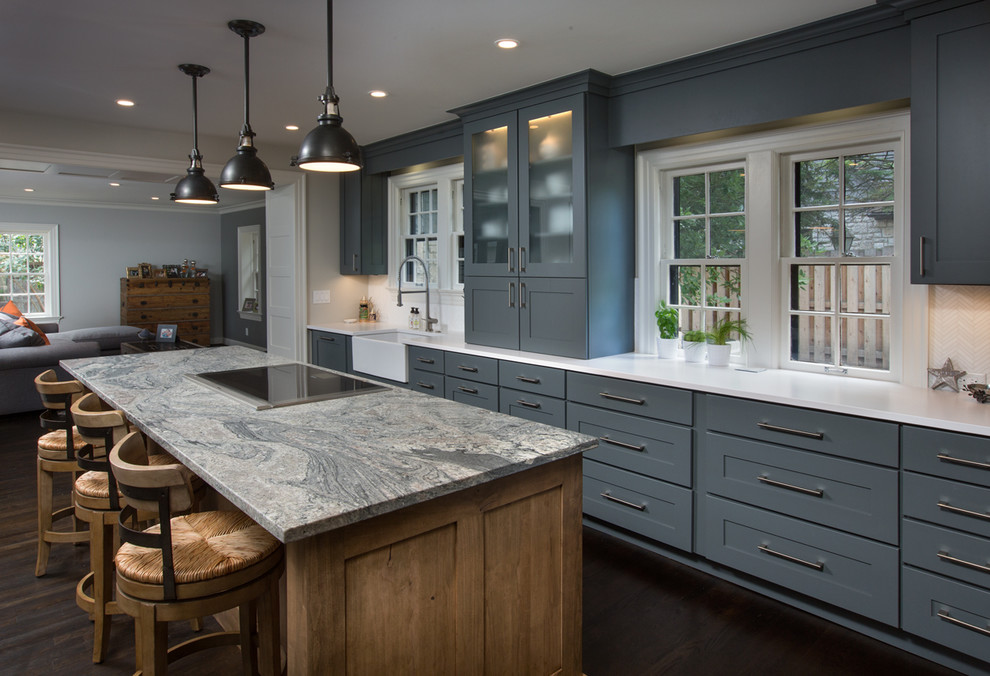Home design - transitional dark wood floor home design idea in Columbus with a farmhouse sink, shaker cabinets, gray cabinets and an island