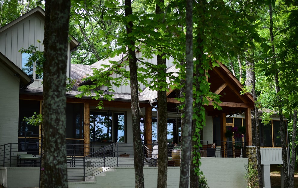 Large rustic two-story mixed siding exterior home idea