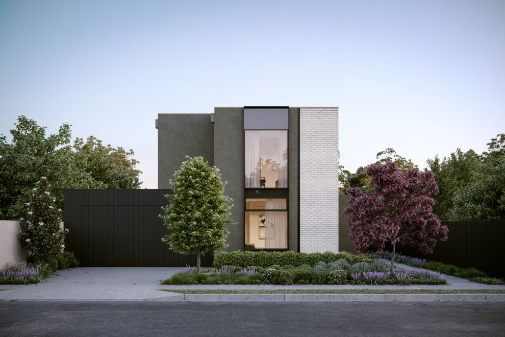 Cette photo montre une façade de maison grise tendance en béton de taille moyenne et à un étage avec un toit plat.