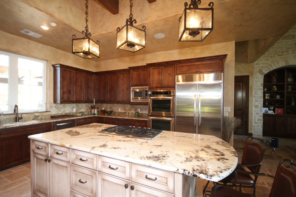 This is an example of a large mediterranean kitchen in Tampa.