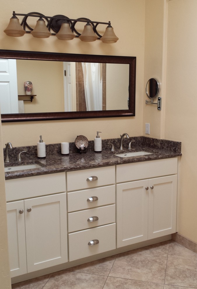 Small transitional master beige tile and porcelain tile porcelain tile bathroom photo in Phoenix with shaker cabinets, beige cabinets, beige walls, an undermount sink and quartz countertops