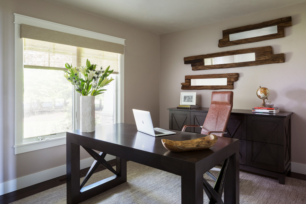 Inspiration for a rustic home office remodel in Milwaukee