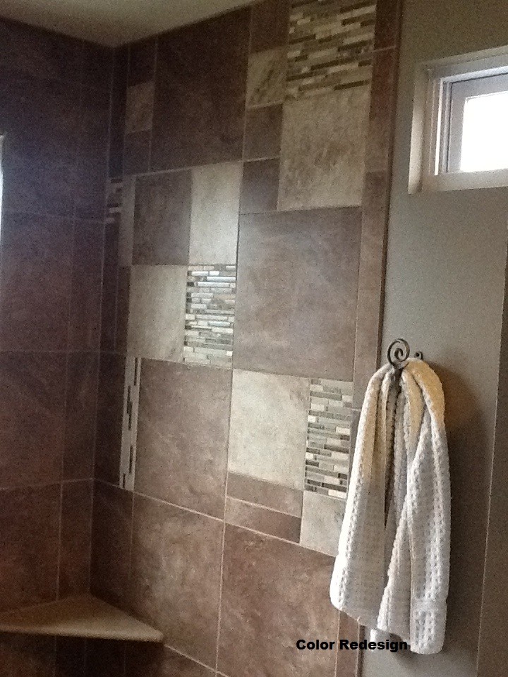 This is an example of a large contemporary master bathroom in Detroit with an open shower, beige tile, ceramic tile and beige walls.