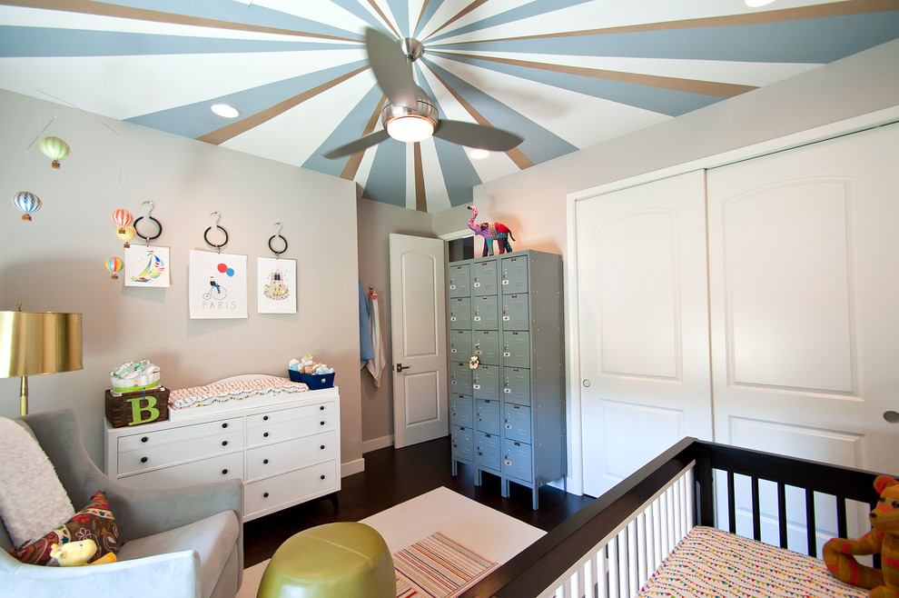 Mid-sized transitional gender-neutral nursery in Phoenix with grey walls and dark hardwood floors.