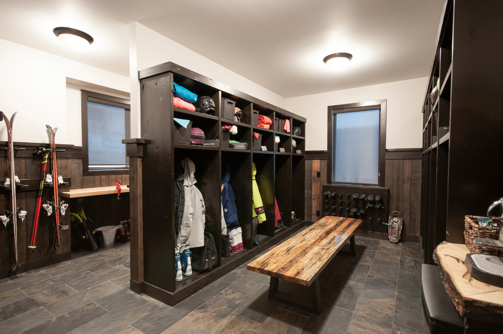 Mudroom - large rustic slate floor and multicolored floor mudroom idea with beige walls