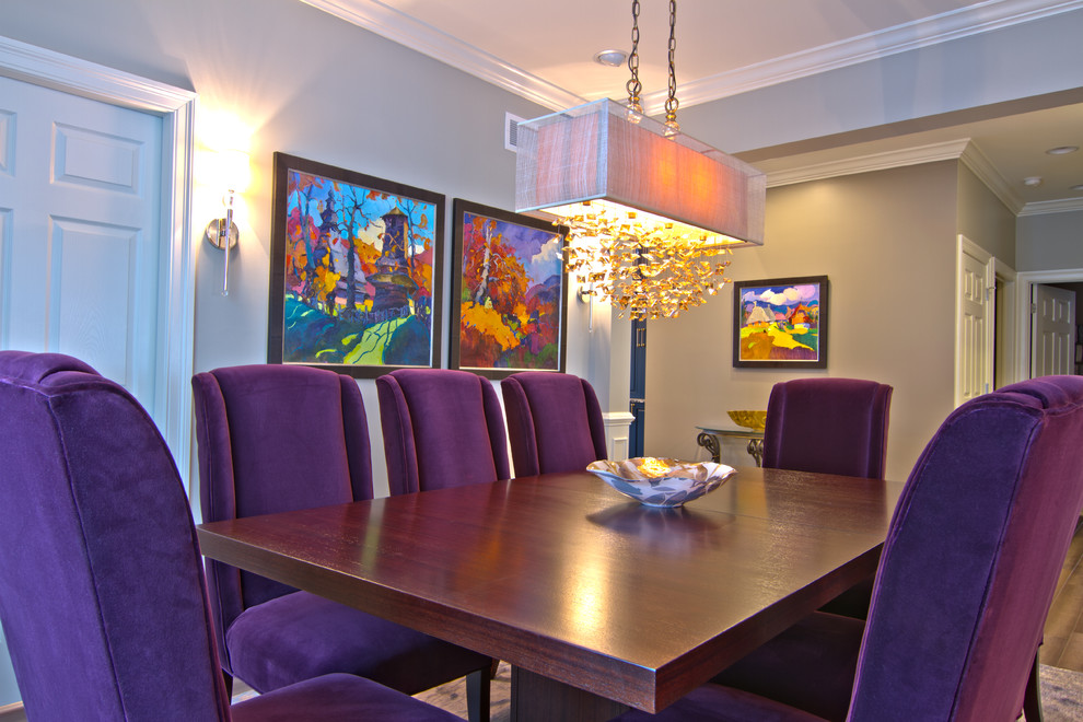Inspiration for a transitional dining room in Other with beige walls and dark hardwood floors.