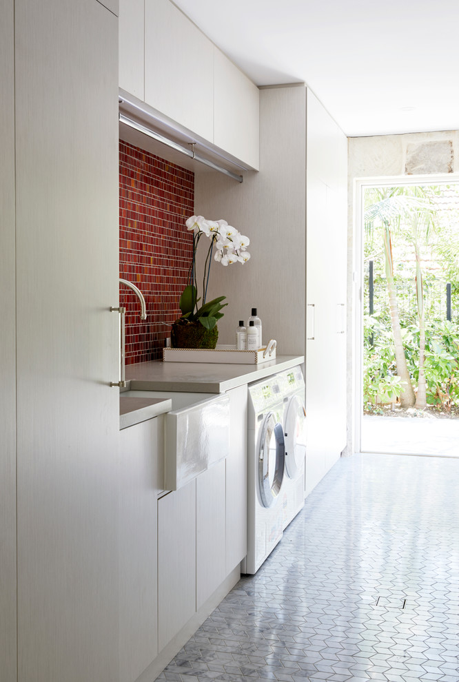 Inspiration for a transitional laundry room in Sydney.