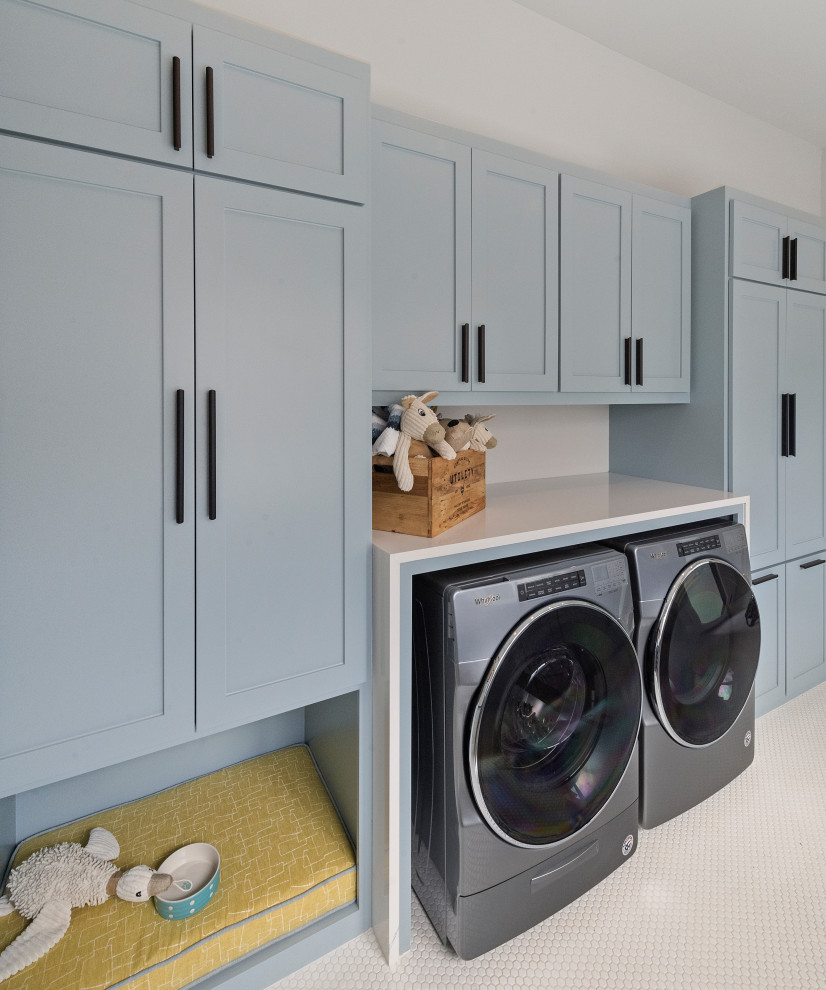 Design ideas for a transitional laundry room in Dallas.