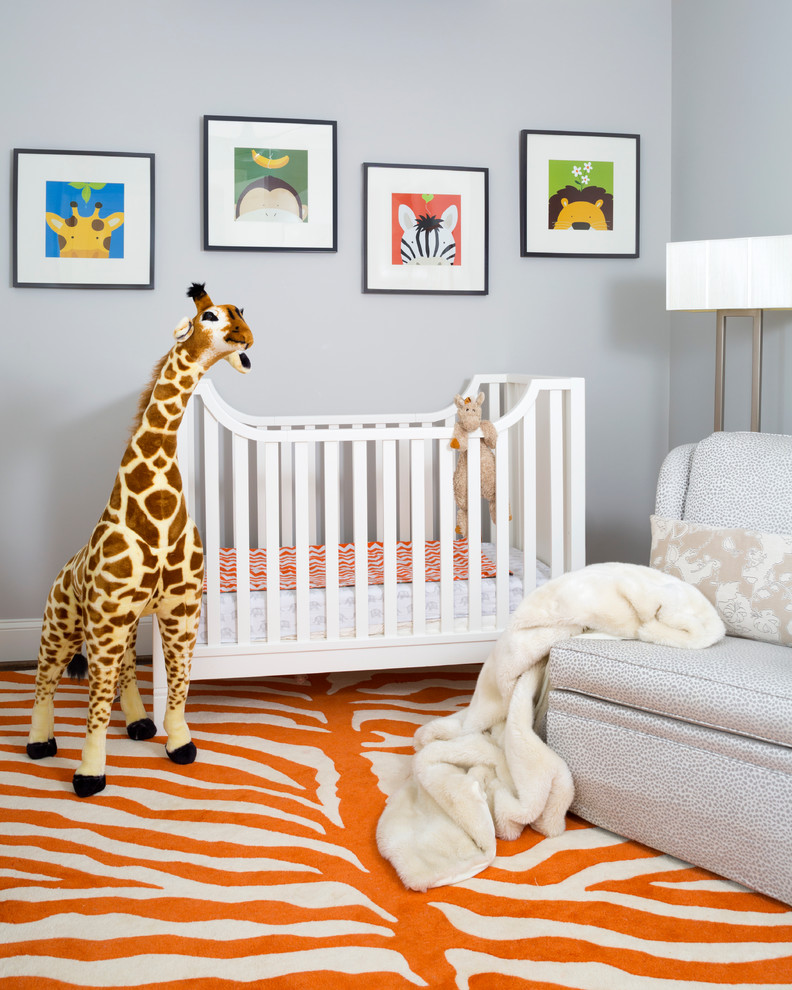 This is an example of a transitional gender-neutral nursery in DC Metro with grey walls and orange floor.