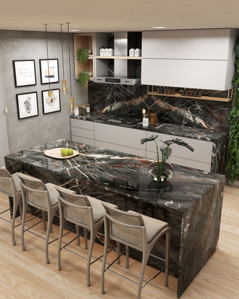 Example of a large kitchen design in Tampa with quartzite countertops, an island and black countertops