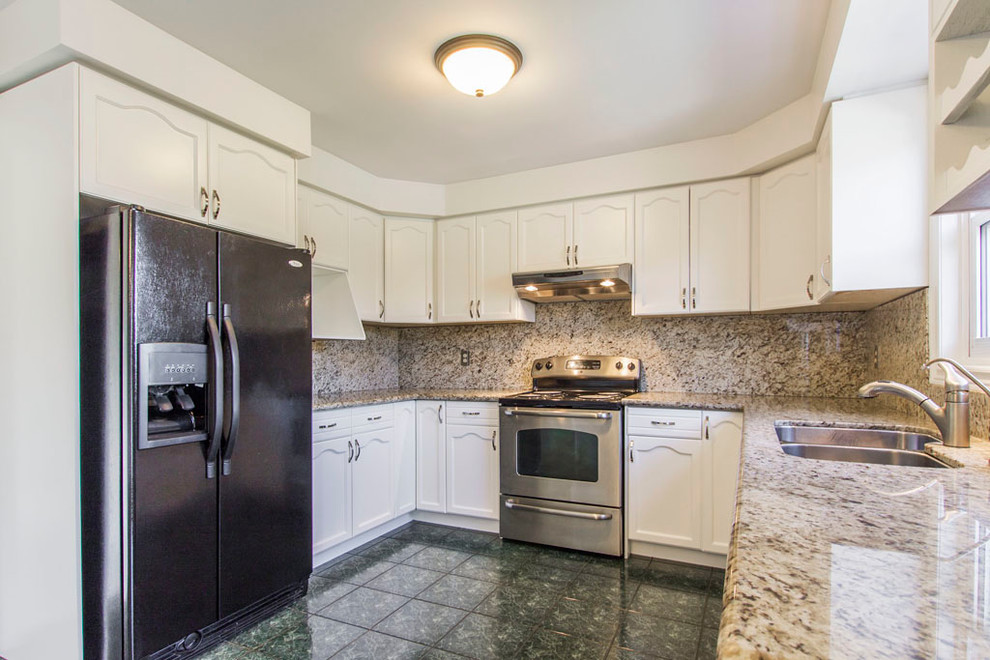 Kitchen - transitional kitchen idea in Toronto
