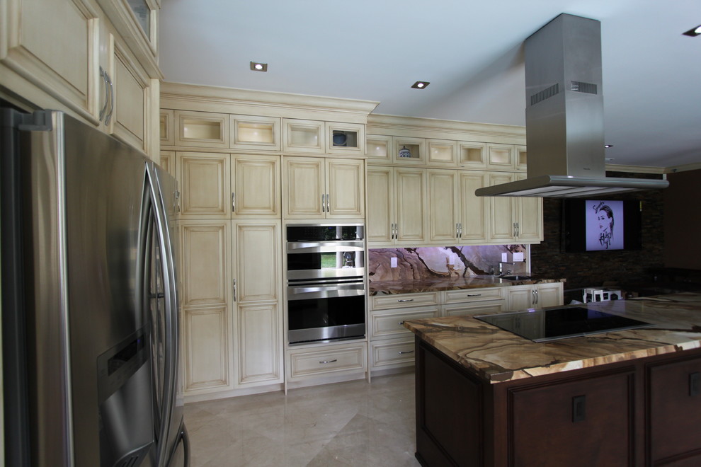 Inspiration for a large transitional u-shaped porcelain tile eat-in kitchen remodel in Miami with an undermount sink, raised-panel cabinets, light wood cabinets, quartz countertops, multicolored backsplash, porcelain backsplash, stainless steel appliances and an island