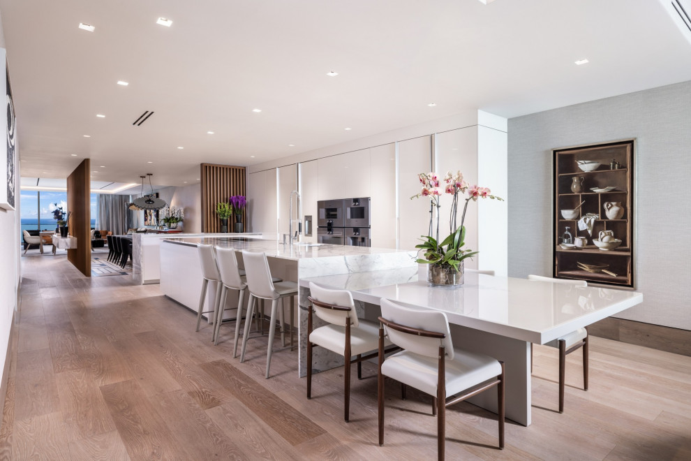 Modern Luxury Kitchen with Integrated Dining | Sleek White & Custom ...