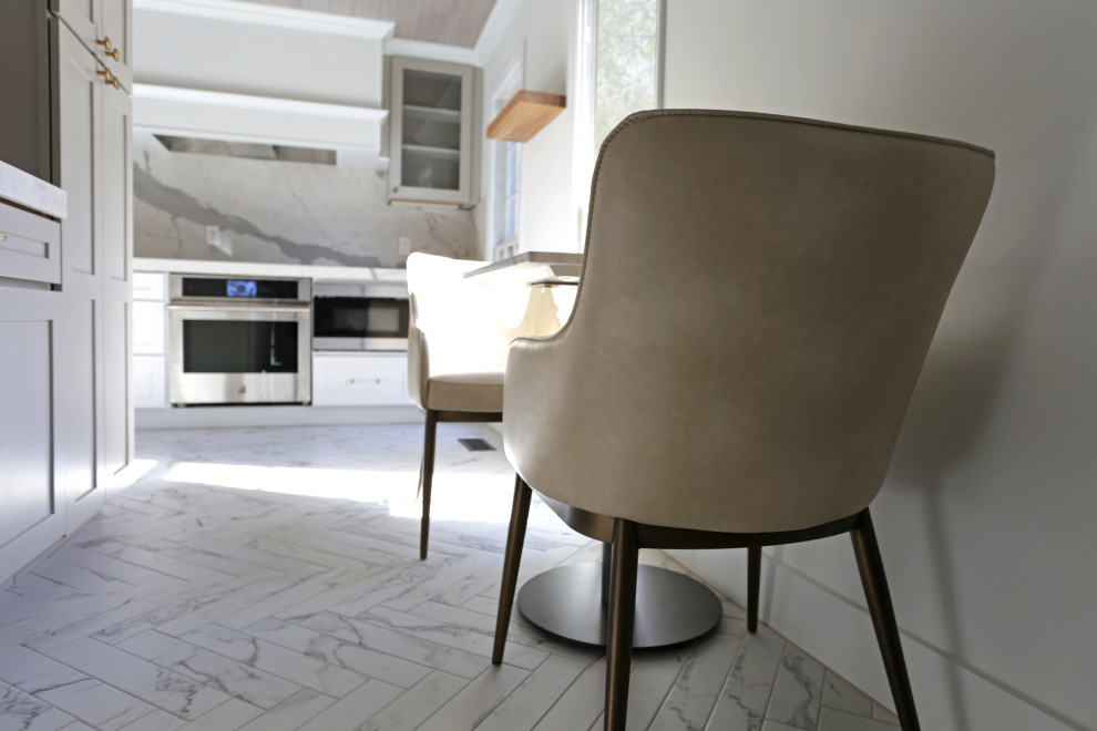 Inspiration for a mid-sized transitional l-shaped marble floor, white floor and exposed beam kitchen remodel in DC Metro with an undermount sink, shaker cabinets, white cabinets, quartzite countertops, white backsplash, quartz backsplash and stainless steel appliances