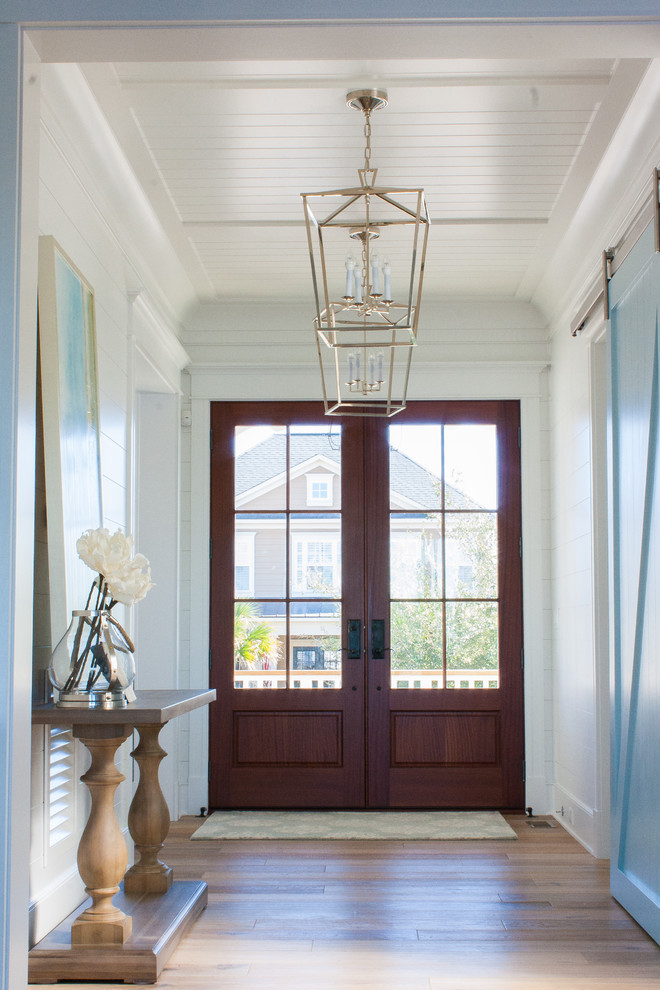 This is an example of a beach style entryway in Charleston.
