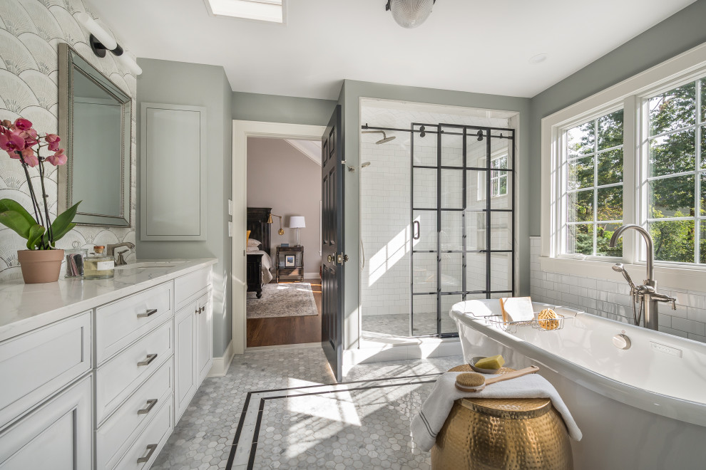 Inspiration for a large transitional master gray tile and marble tile marble floor, gray floor, double-sink and coffered ceiling bathroom remodel in Newark with recessed-panel cabinets, white cabinets, green walls, an undermount sink, quartz countertops, white countertops and a built-in vanity