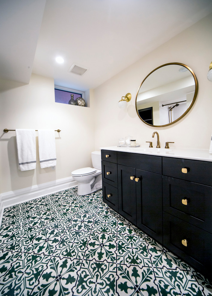 Inspiration for a mid-sized transitional kids' ceramic tile and green floor alcove bathtub remodel in Ottawa with shaker cabinets, black cabinets, a two-piece toilet, beige walls, an integrated sink and quartzite countertops