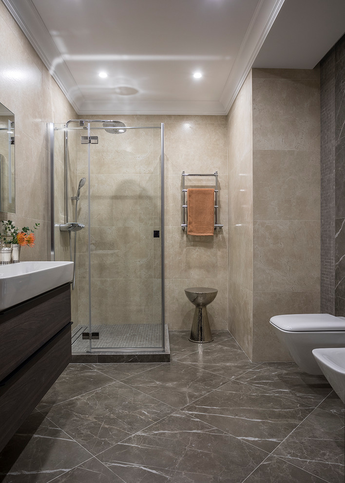 Design ideas for a contemporary 3/4 bathroom in Moscow with a corner shower, a wall-mount toilet, beige tile, grey floor, flat-panel cabinets, dark wood cabinets, beige walls, a trough sink and white benchtops.