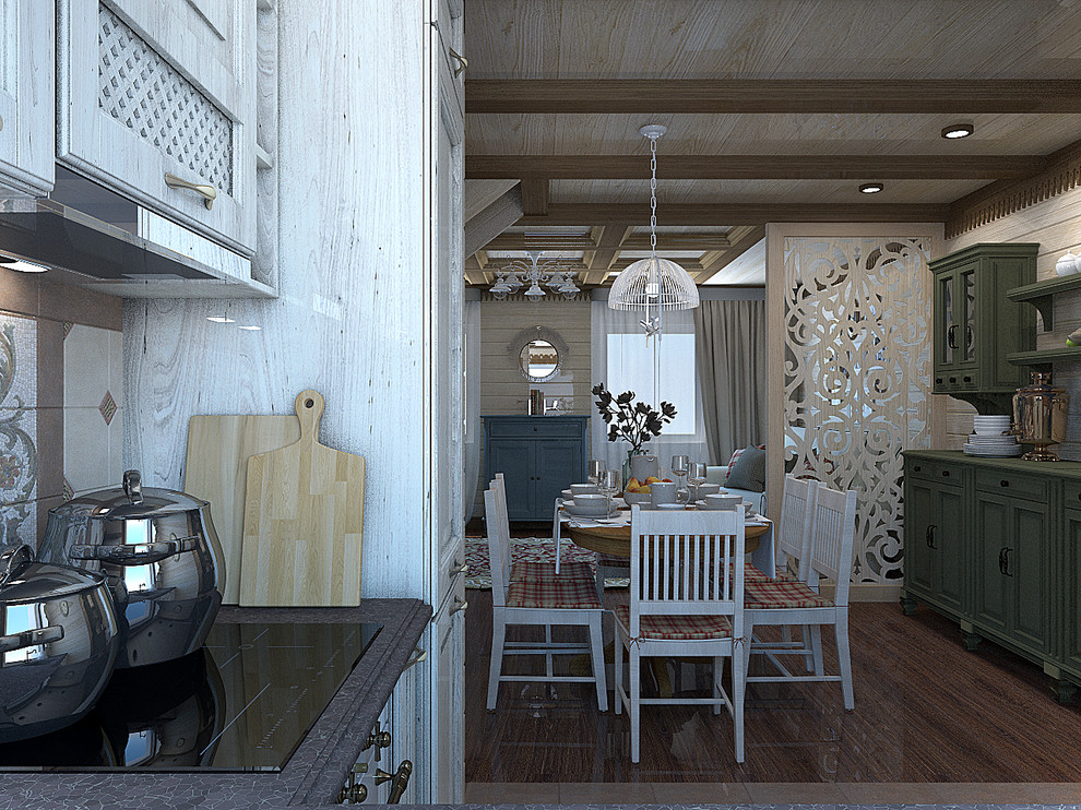 Вид из кухонной зоны на столовую и гостиную