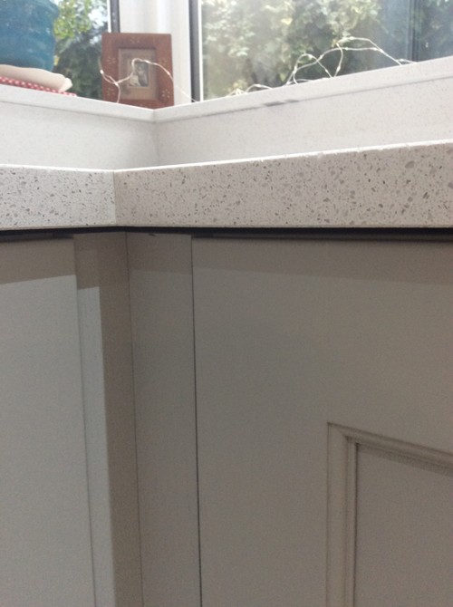 New Quartz countertops sitting on shims.