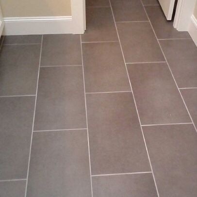 Which direction should I lay the 12x24 vinyl tiles in our bathroom?
