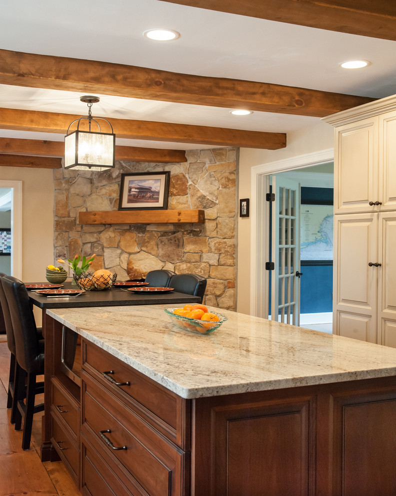 Eat-in kitchen - large transitional eat-in kitchen idea in Boston with an island